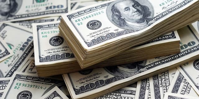 کاهش قیمت دلار پس از ادغام تالارها/ دلار رسمی چند شد؟